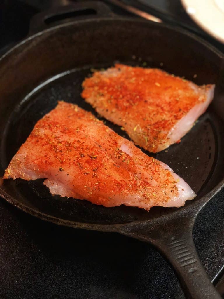 two filets of blackened grouper