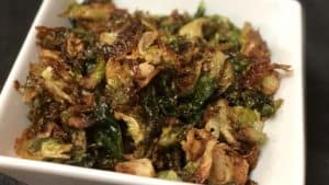a bowl of fried Brussels sprouts