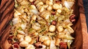 cabbage and gnocchi in a wooden bowl