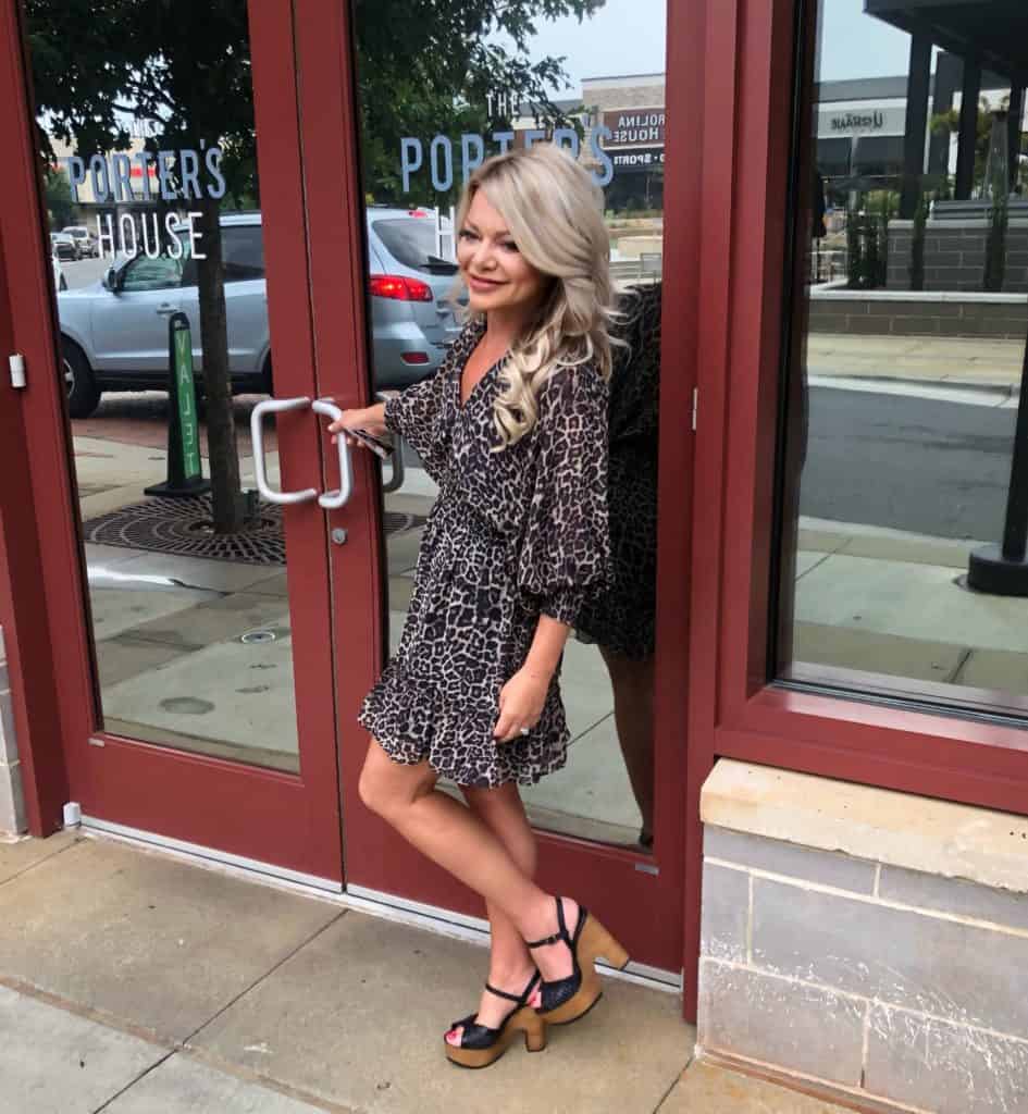 Me wearing a leopard print dress from Storia