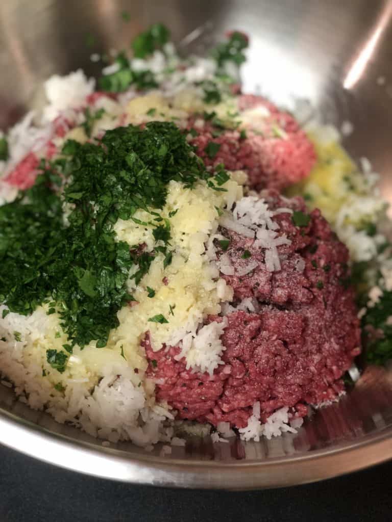 a bowl of meat for cabbage rolls