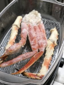 king and snow crab legs in an electric steamer