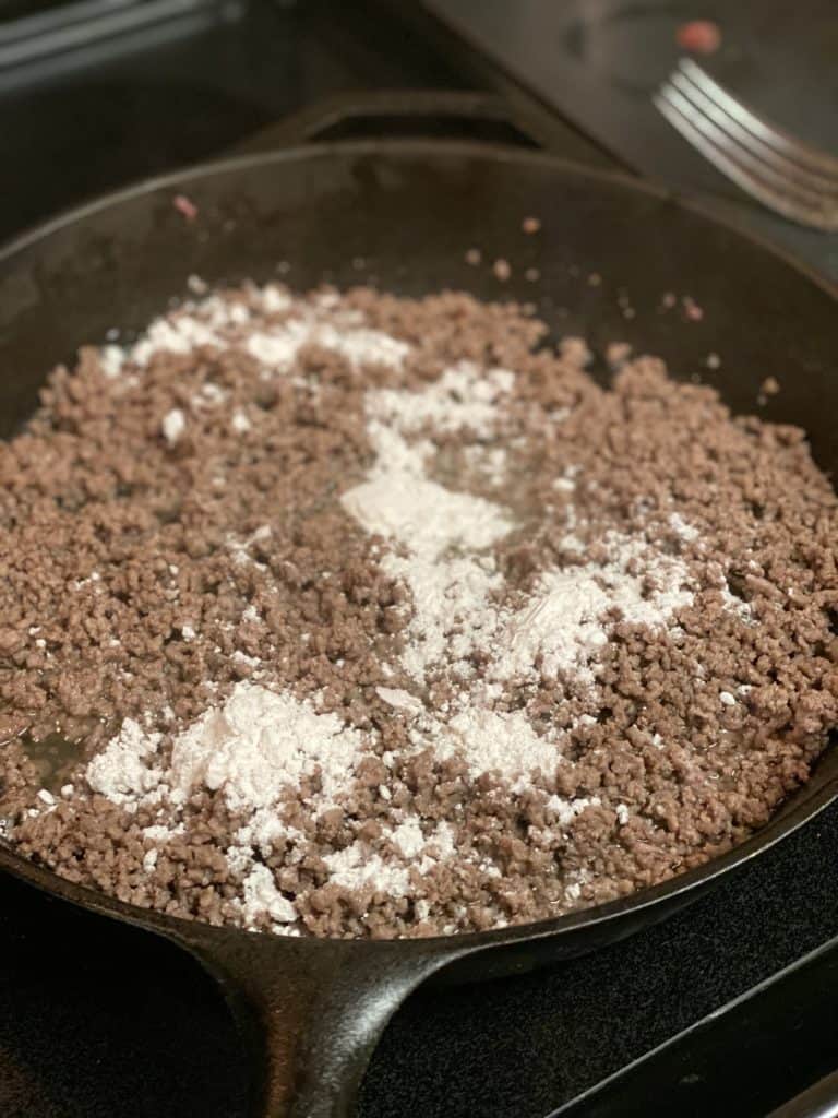 flour sprinkled on cooked beef