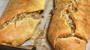 two nut rolls on a pan