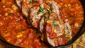 sliced braciole in sauce