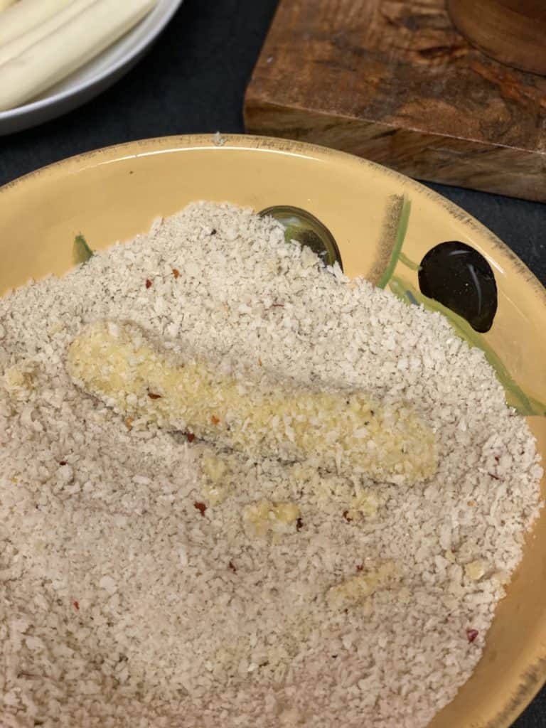 a cheese stick coated in breading