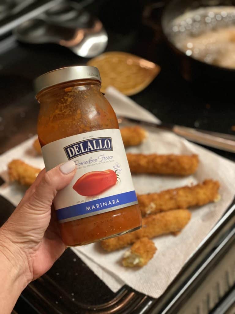 a jar of Delallo marinara sauce for fried mozzarella sticks