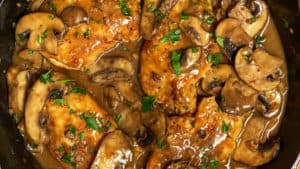 a cast iron pan of chicken marsala