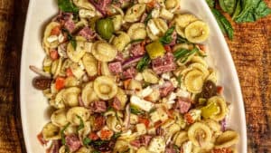 a white bowl filled with pasta salad
