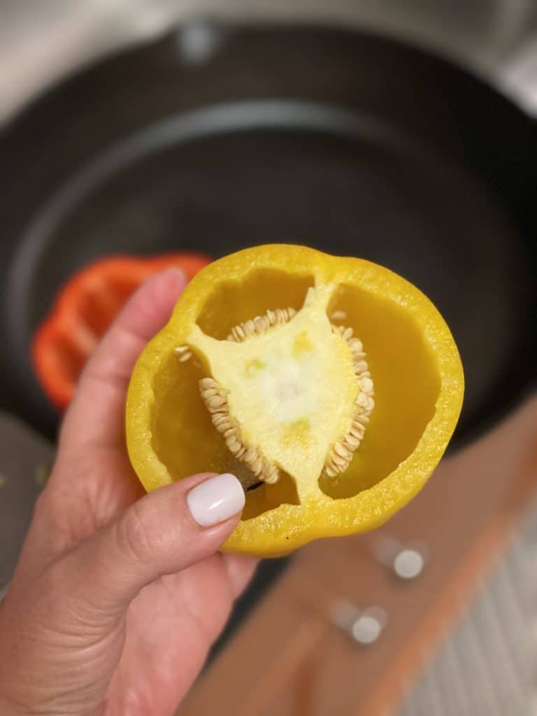a yellow bell pepper with the top cut off