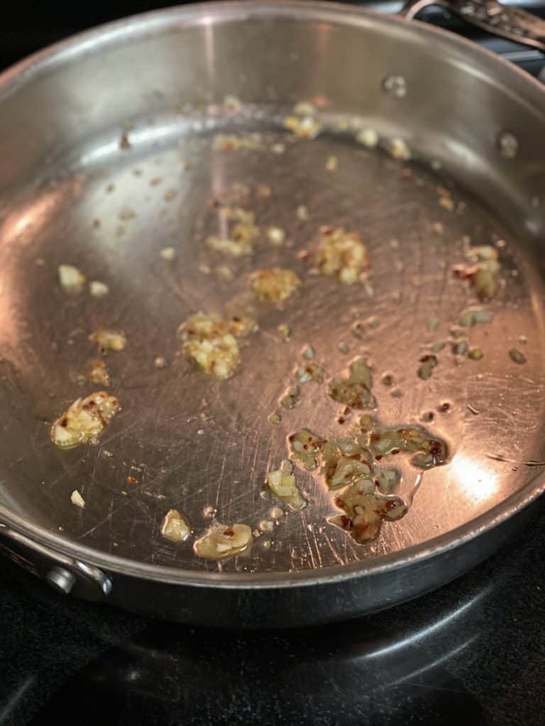 olive oil, ginger, garlic and crushed red pepper in a sauce pan