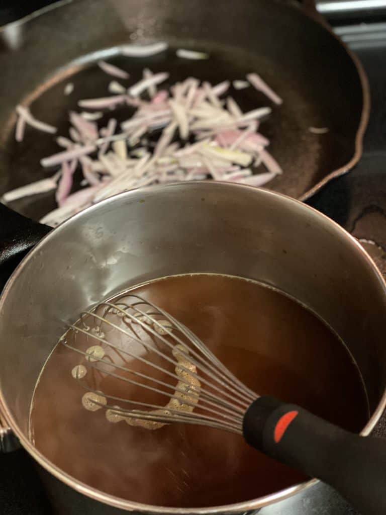 demi-glace and stock in a pot