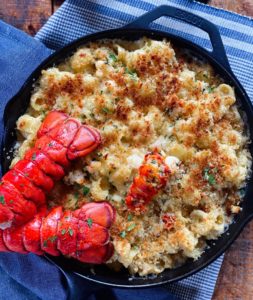 a cast iron pan of lobster mac and cheese