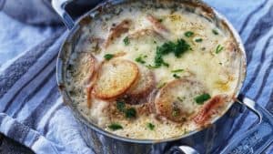two pots of scalloped potatoes