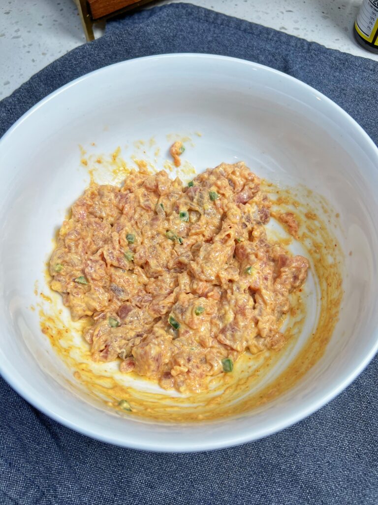 Diced fresh tuna mixed with a spicy mayo for Spicy Tuna Rice Squares.