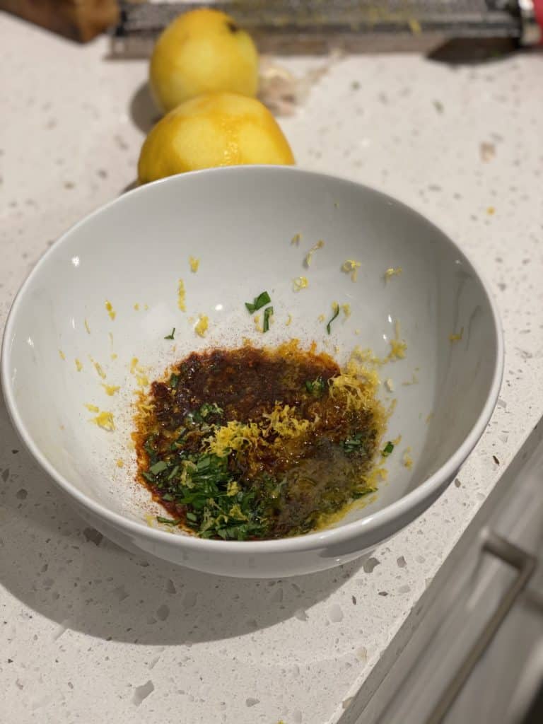 salmon rub in a white bowl for herb and honey roasted salmon