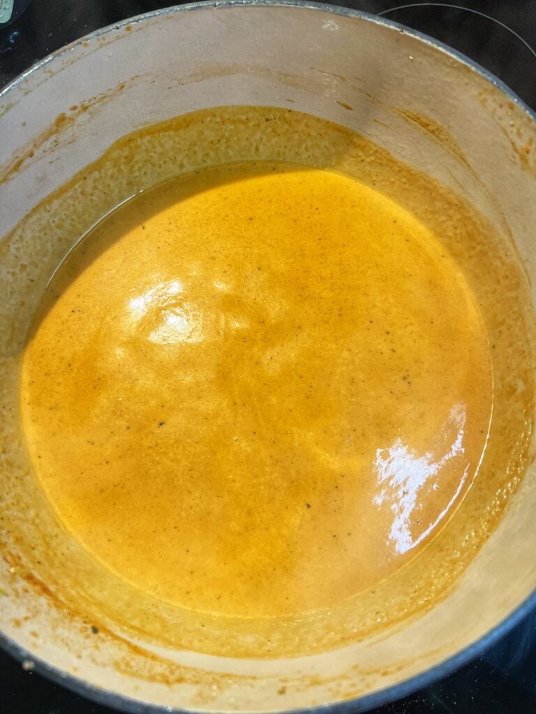 A pot of lobster base to be used for Creamy Lobster Bisque