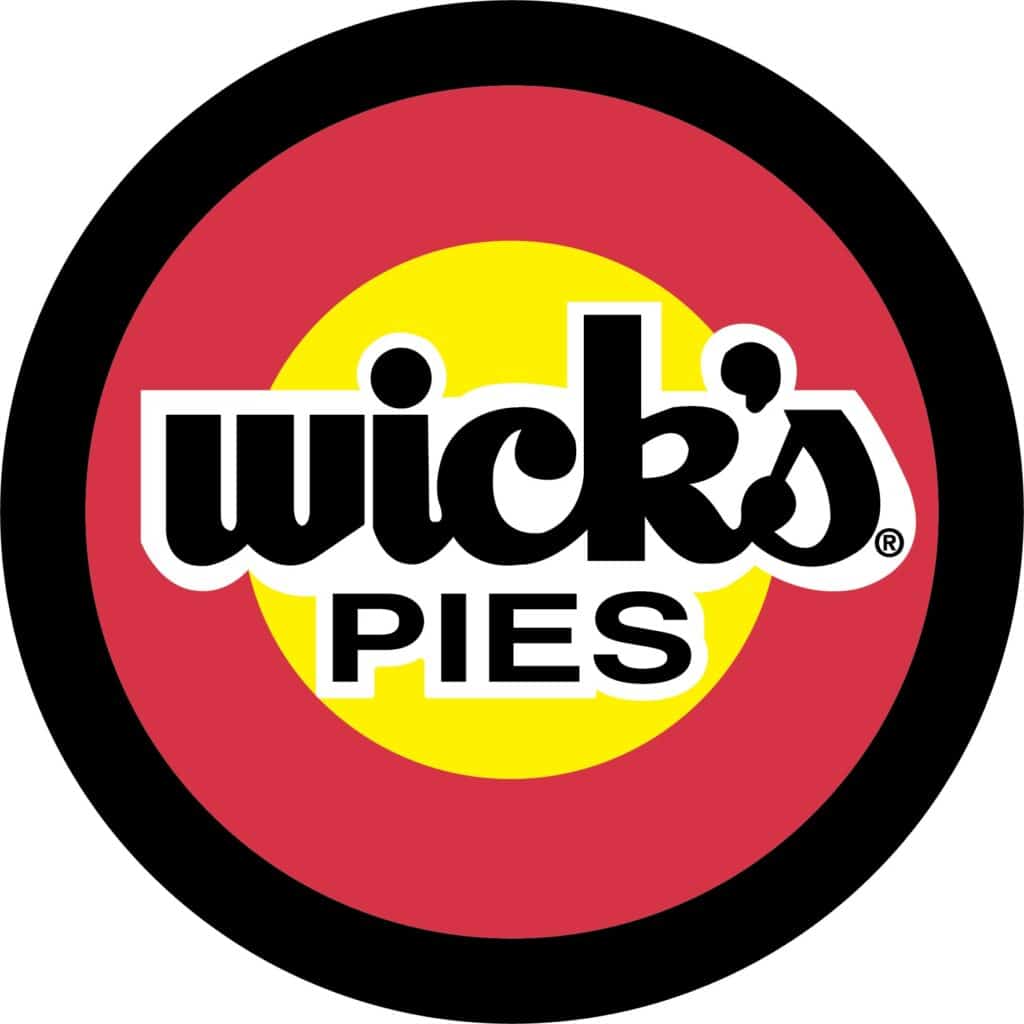 Logo for Wick's Pies. The logo is a target-like circle with black, yellow, red and white.