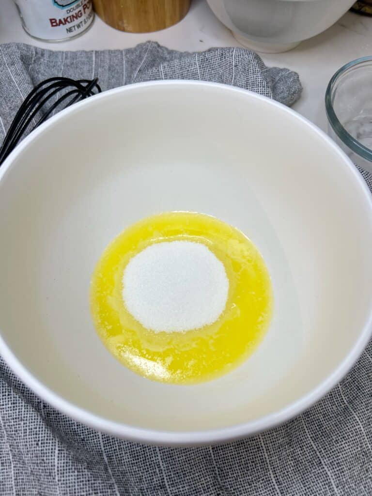 A white bowl of melted butter and sugar.