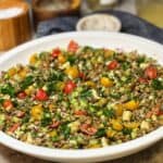 A large white bowl filled with easy lentil salad.