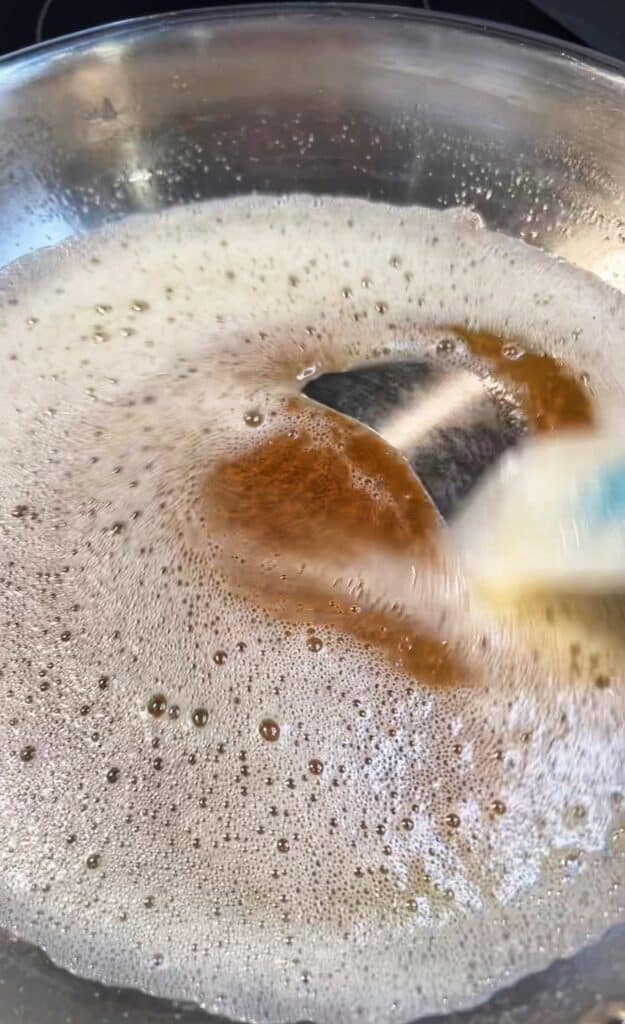 Butter browning in a pan.