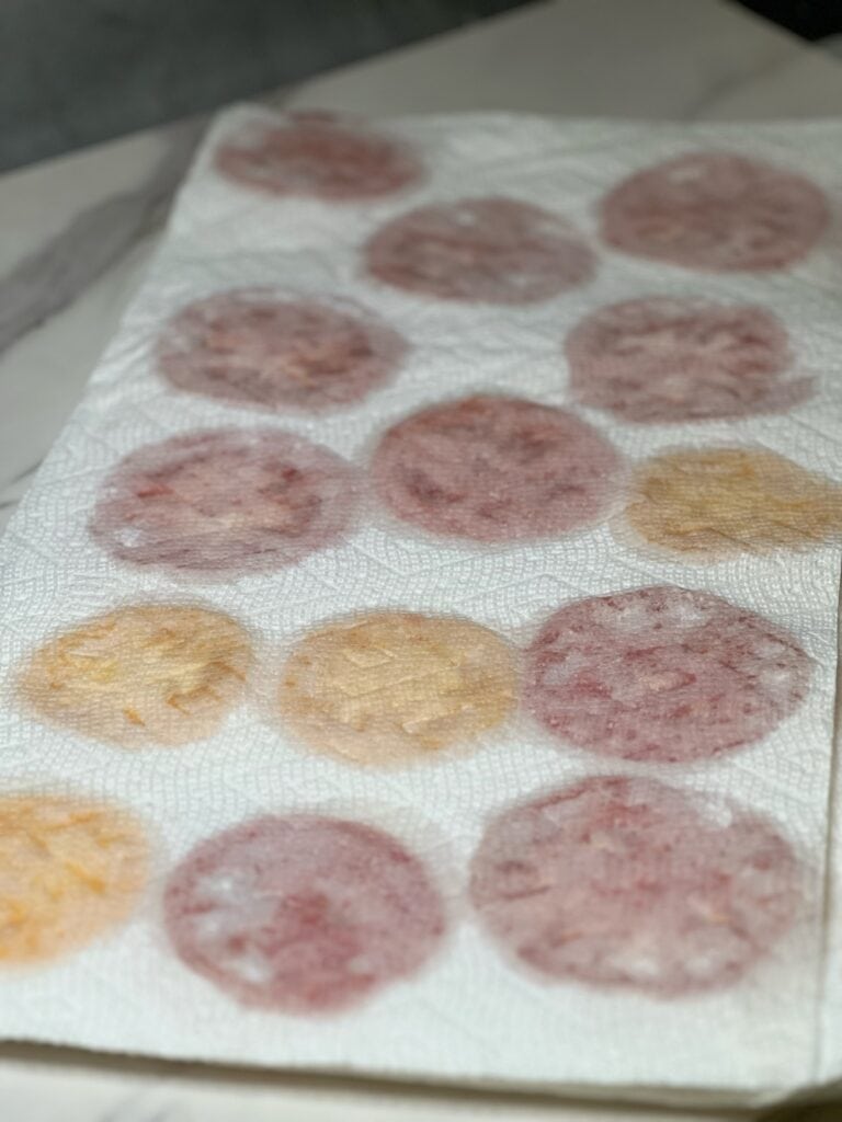 A thin layer of paper towels on top of tomato slices to draw out excess water.