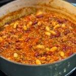 A pot of hearty chili with beans.