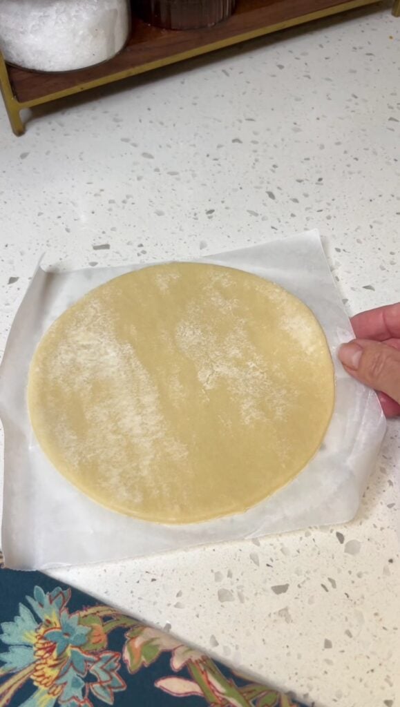 A small, round frozen pie crust from Wick's Pies.