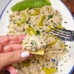 Tuna salad on a piece of cracker.